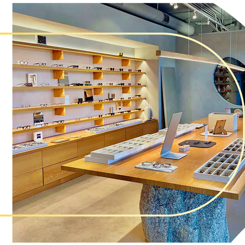 eyeglass shop with stone and wood counter table