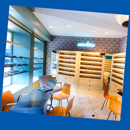 French eyeglass store blue 

